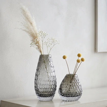 Decorative glass vase with textured design