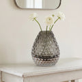 Decorative glass vase with textured design