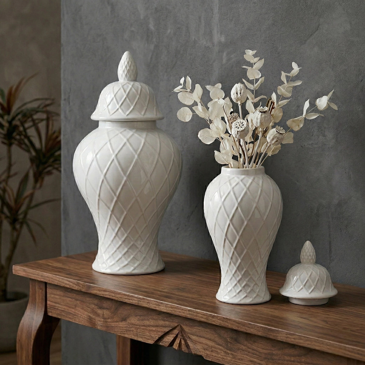 Ivory lattice jar pair on wood, slate scene
