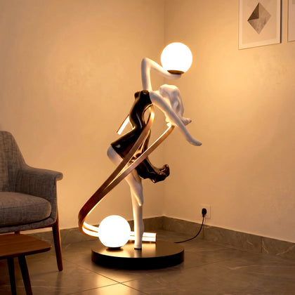 Modern floor lamp with white base and curved wooden arm in a room setting.