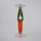 Modern art glass candle holder with green body and orange accent frame