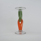 Modern art glass candle holder with green body and orange accent frame