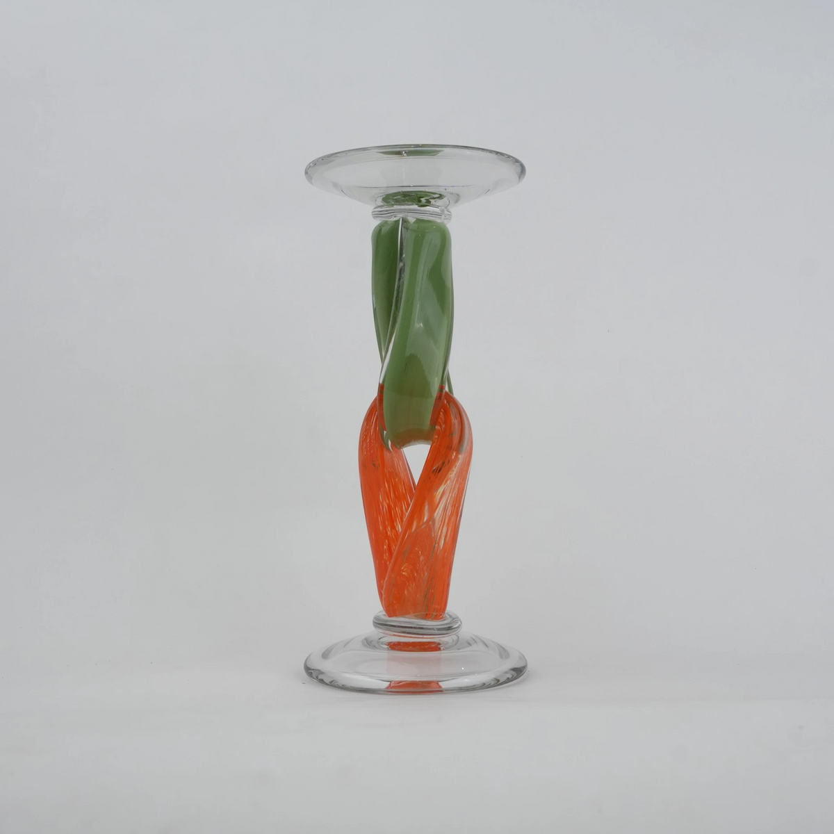Modern art glass candle holder with green body and orange accent frame