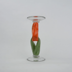 Modern art glass candle holder with green body and orange accent frame