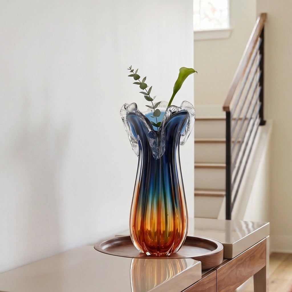 Blue gradient glass vase with multicolor base and clear flared rim