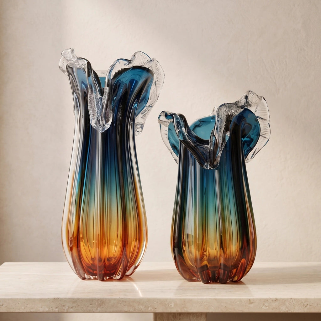 Blue gradient glass vase with multicolor base and clear flared rim
