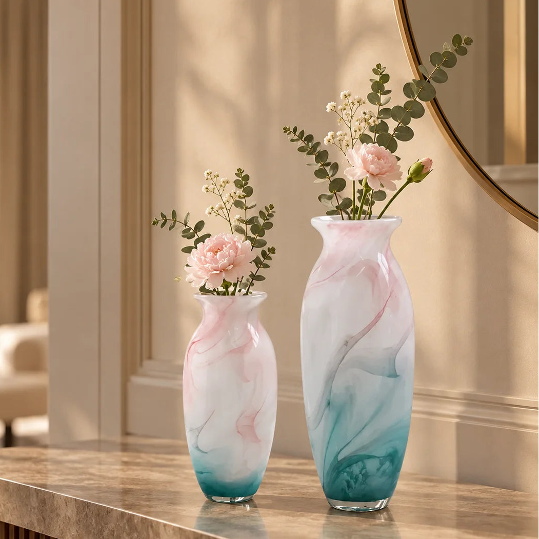 Textured marble-effect glass vase with soft gradient finish and rounded silhouette.