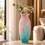 Textured marble-effect glass vase with soft gradient finish and rounded silhouette.