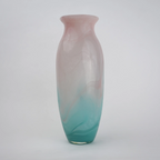 Textured marble-effect glass vase with soft gradient finish and rounded silhouette.