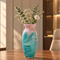 Textured marble-effect glass vase with soft gradient finish and rounded silhouette.