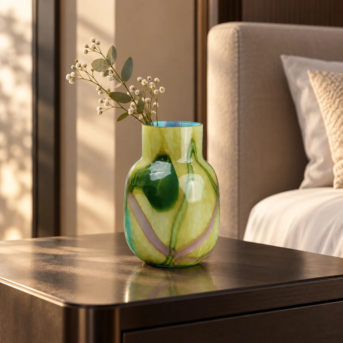 Blue marble effect glass vase with a smooth glossy finish, featuring a rounded body and short cylindrical neck, designed as a modern decorative piece for home decor styling.