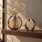 Radiant orb vase, vertical stripes, front shot