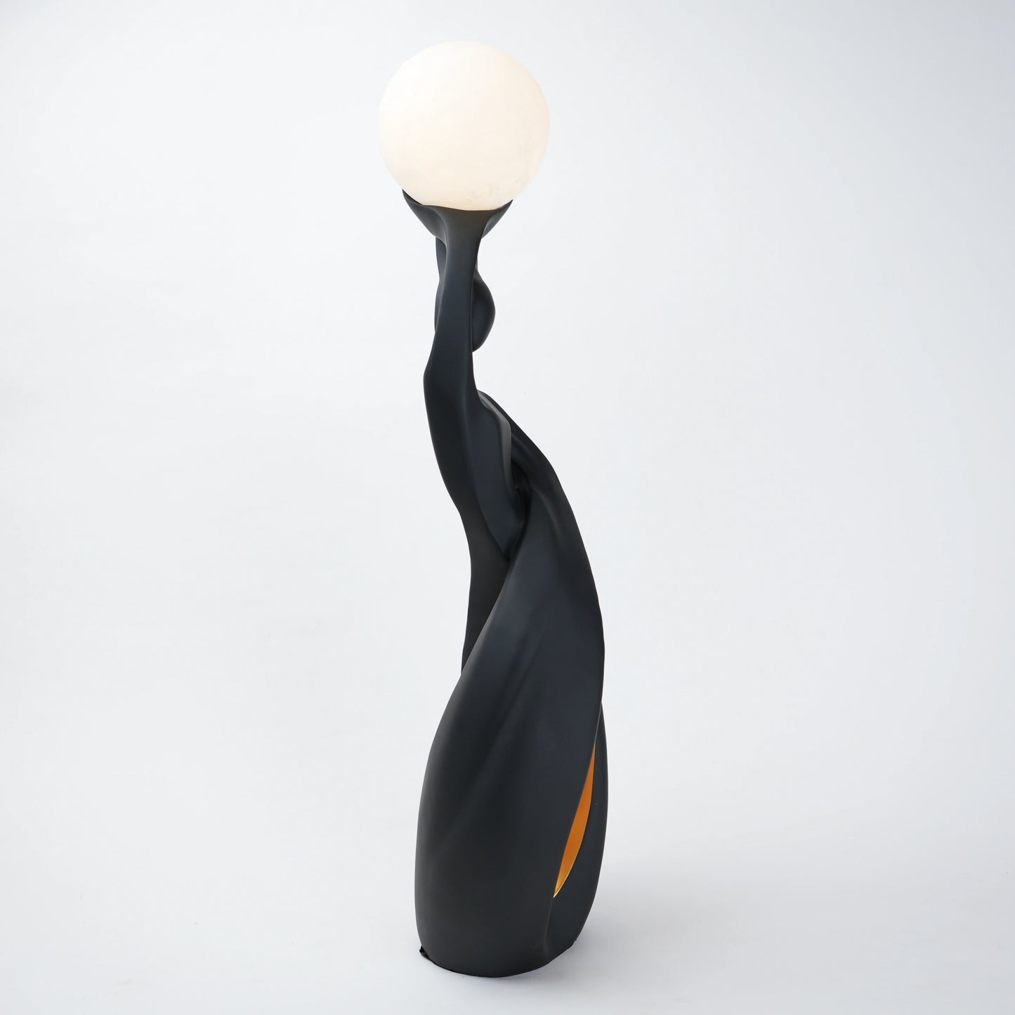 modern sculptural table lamp with glowing orb ambient lighting