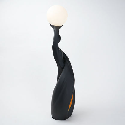 modern sculptural table lamp with glowing orb ambient lighting