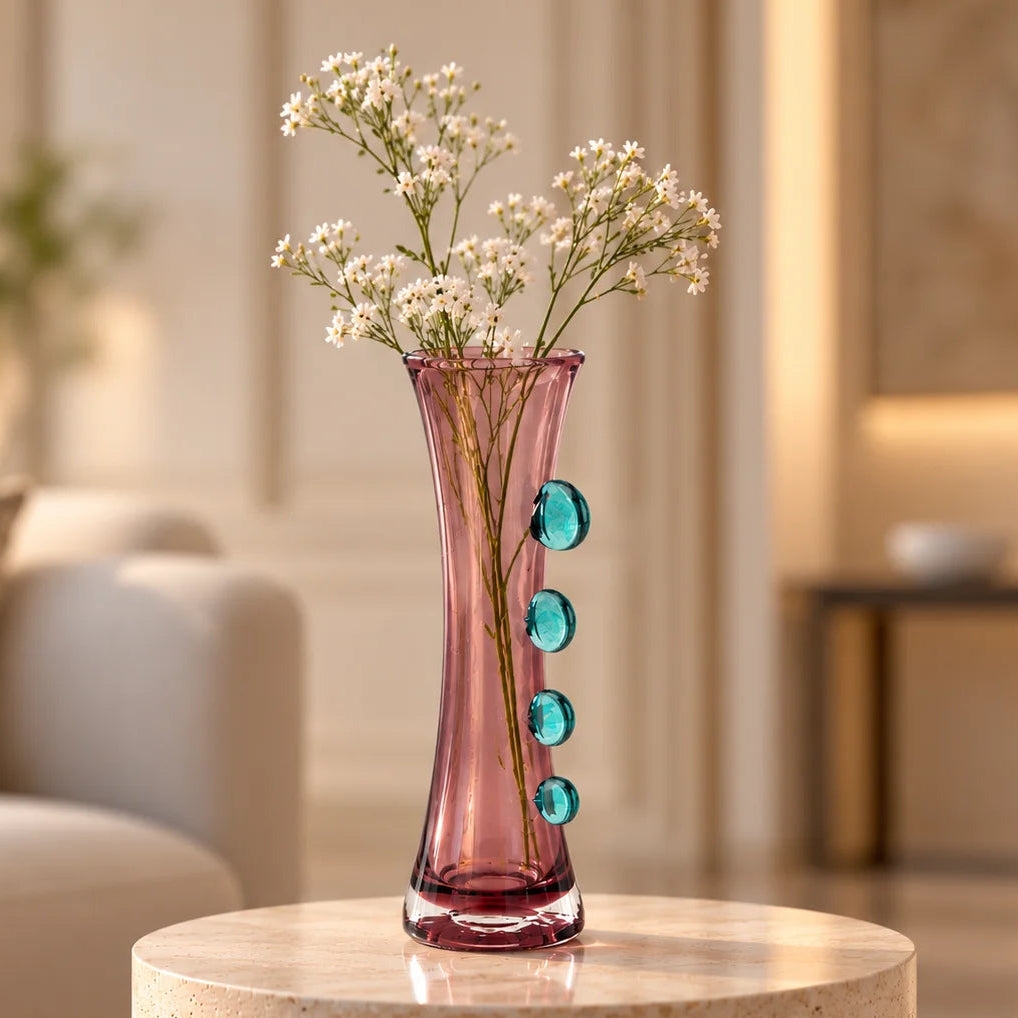 Purple art glass vase with elongated silhouette and raised translucent side accents.