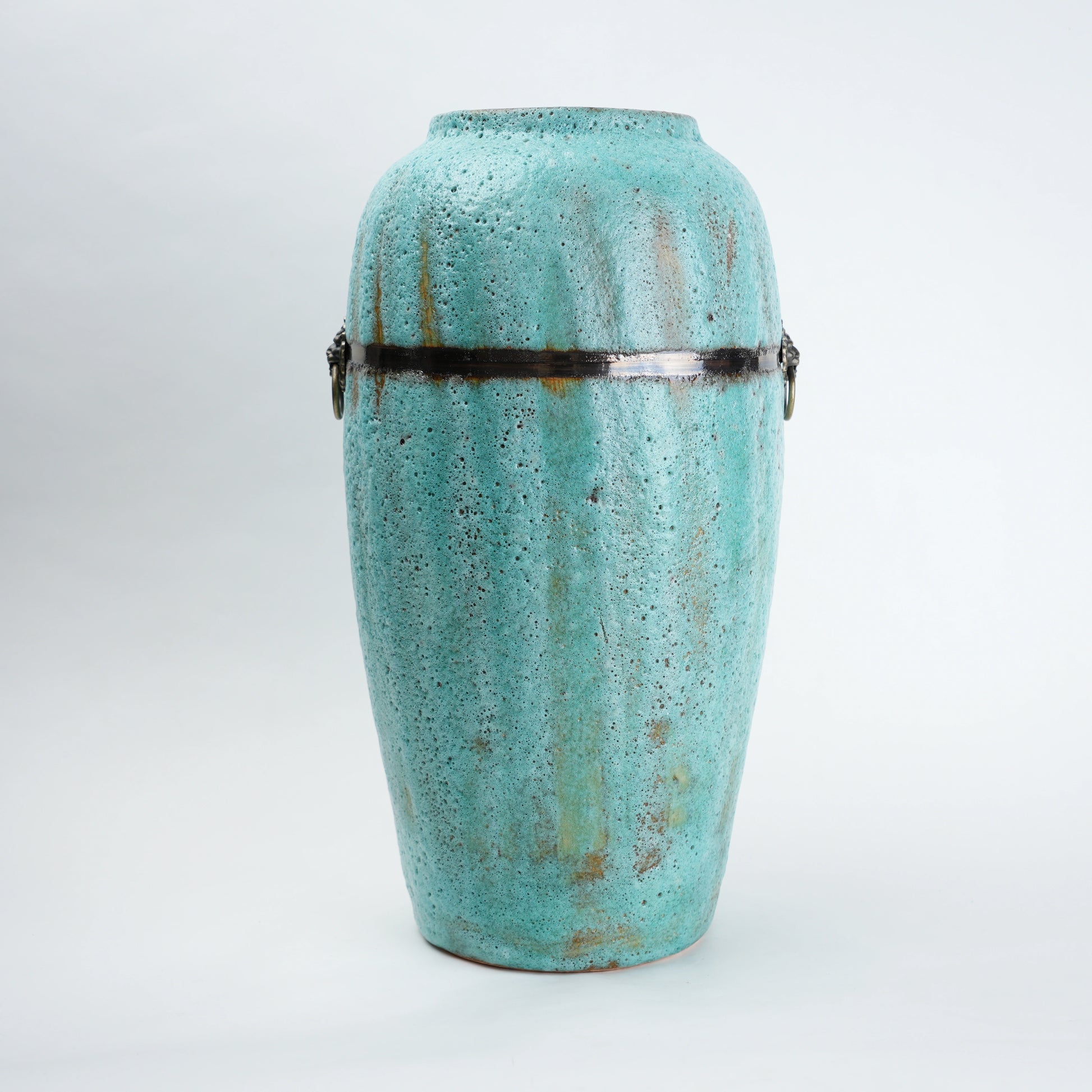Turquoise patina vase w/ lion rings, front
