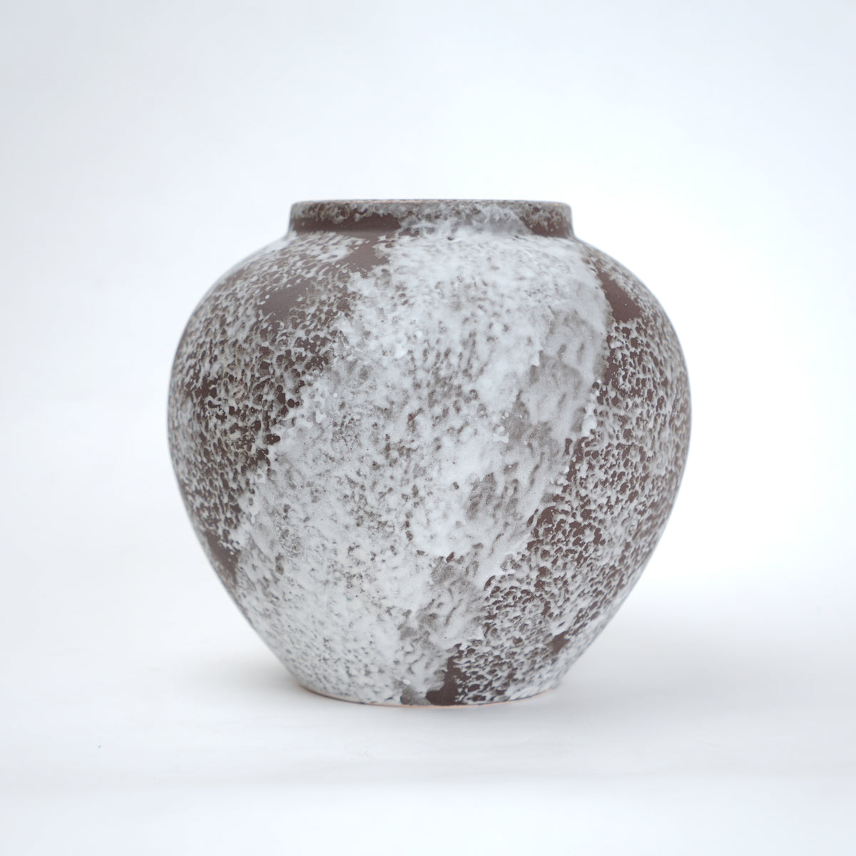 Mineral glaze ceramic vase in brown and white textured finish available in small medium and large sizes