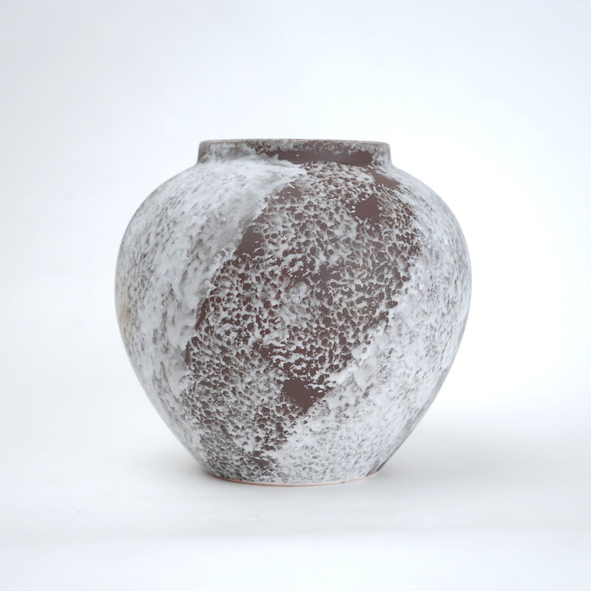 Mineral glaze ceramic vase in brown and white textured finish available in small medium and large sizes