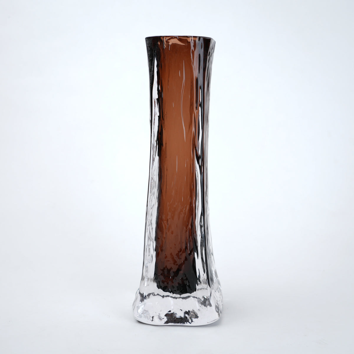Glass vase with brown and clear design on a white background