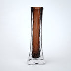Modern brown glass vase with smooth upper surface and textured clear base suitable for table and shelf decor