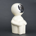 Modern human form decor in ivory white with chrome accent for contemporary home styling