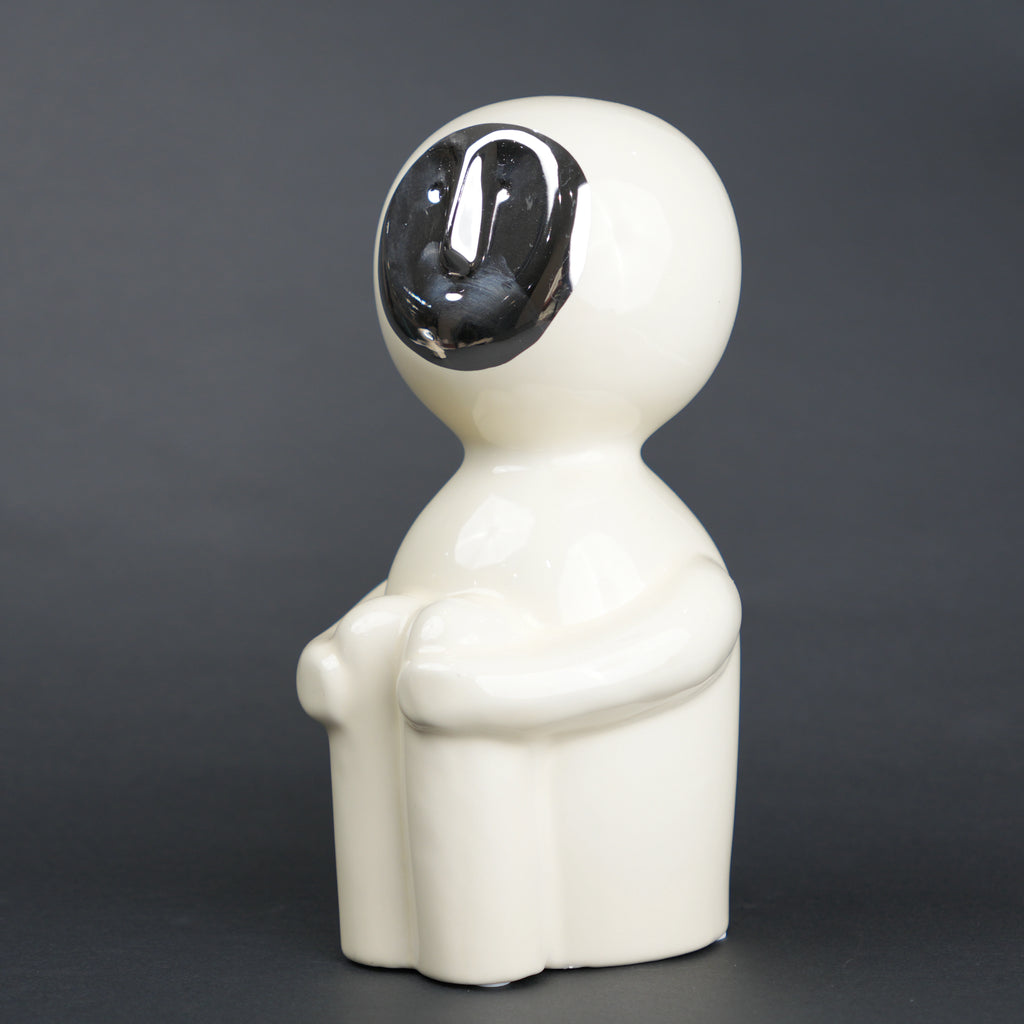 Modern human form decor in ivory white with chrome accent for contemporary home styling