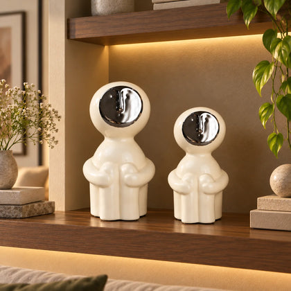 Modern human form decor in ivory white with chrome accent for contemporary home styling