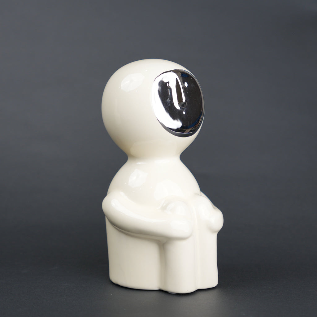 Modern human form decor in ivory white with chrome accent for contemporary home styling