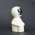 Modern human form decor in ivory white with chrome accent for contemporary home styling