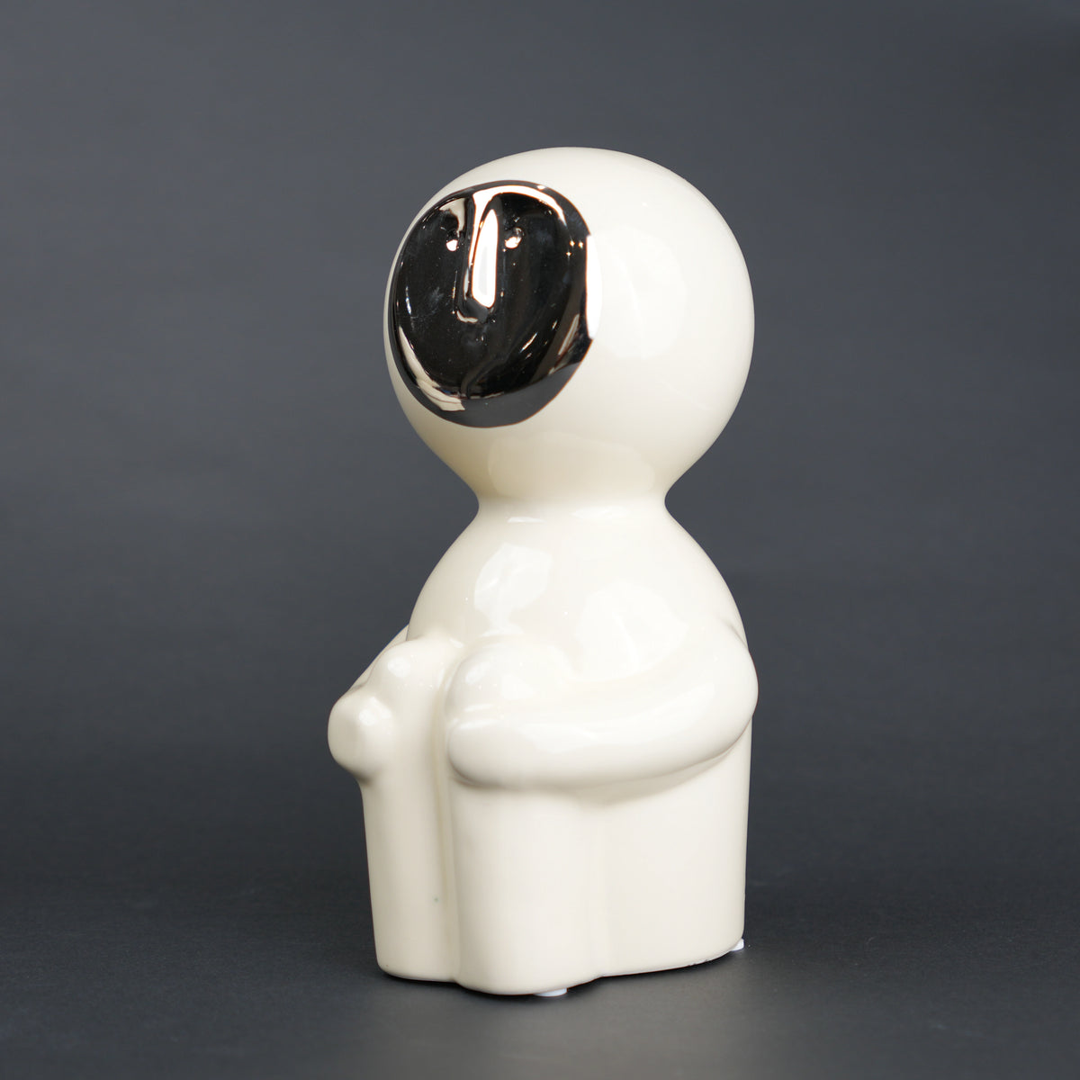 Modern human form decor in ivory white with chrome accent for contemporary home styling