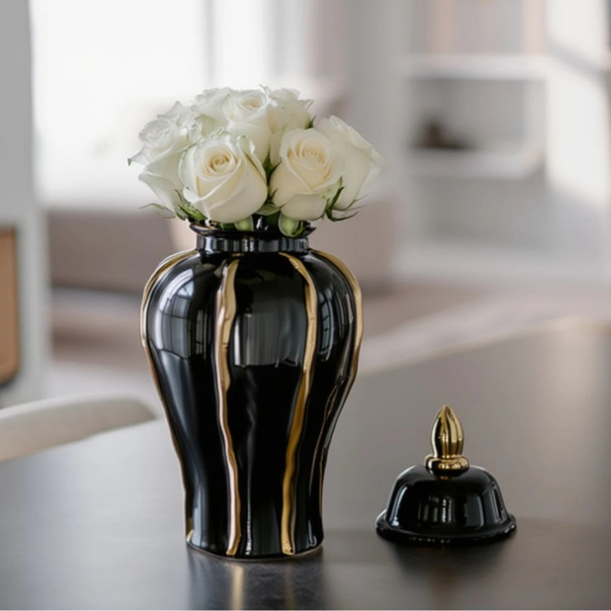 Small noir flow jar w/ roses, grey console