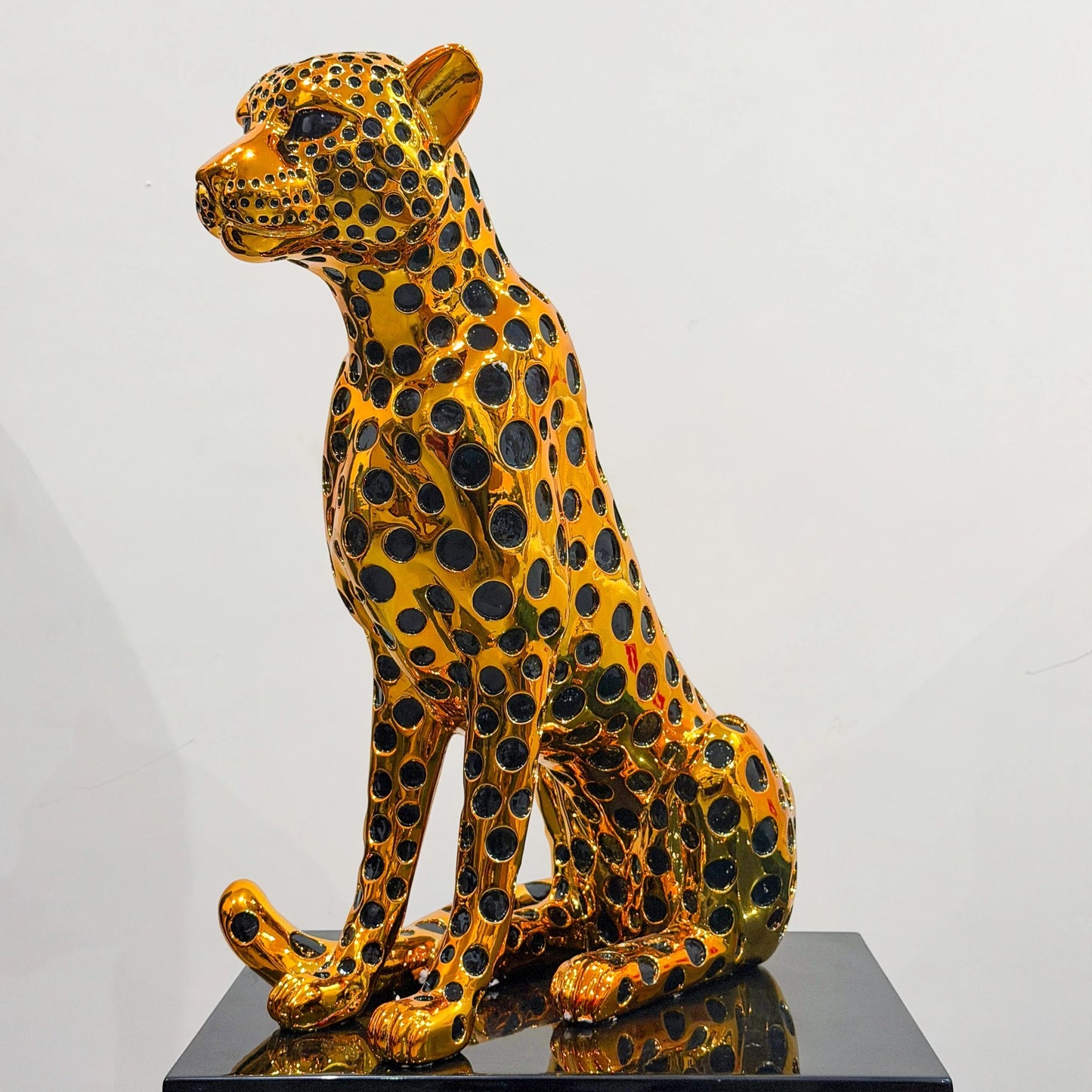 luxury leopard figurine in gold with black detailing modern decor