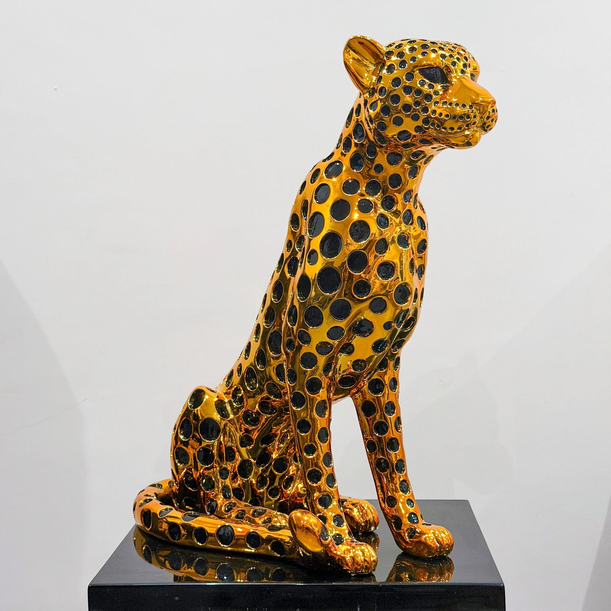 luxury leopard figurine in gold with black detailing modern decor