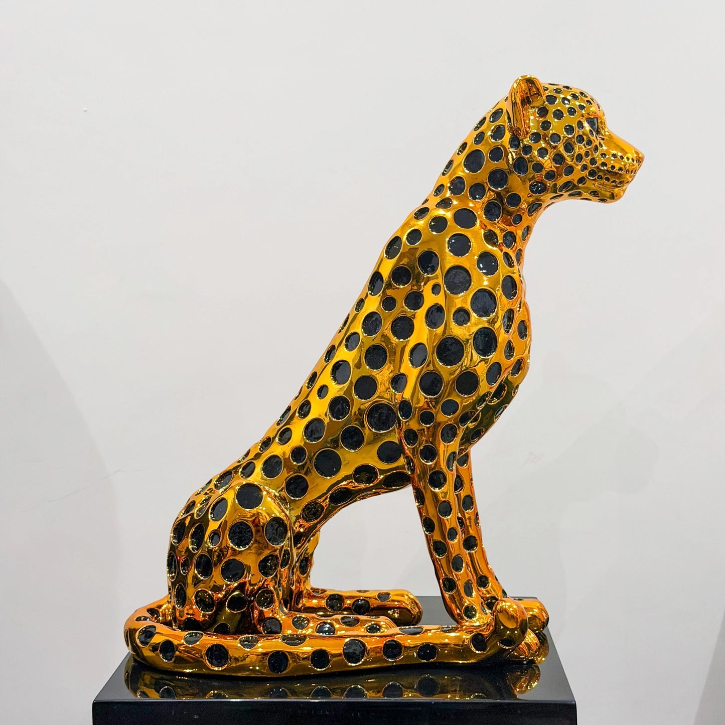 luxury leopard figurine in gold with black detailing modern decor
