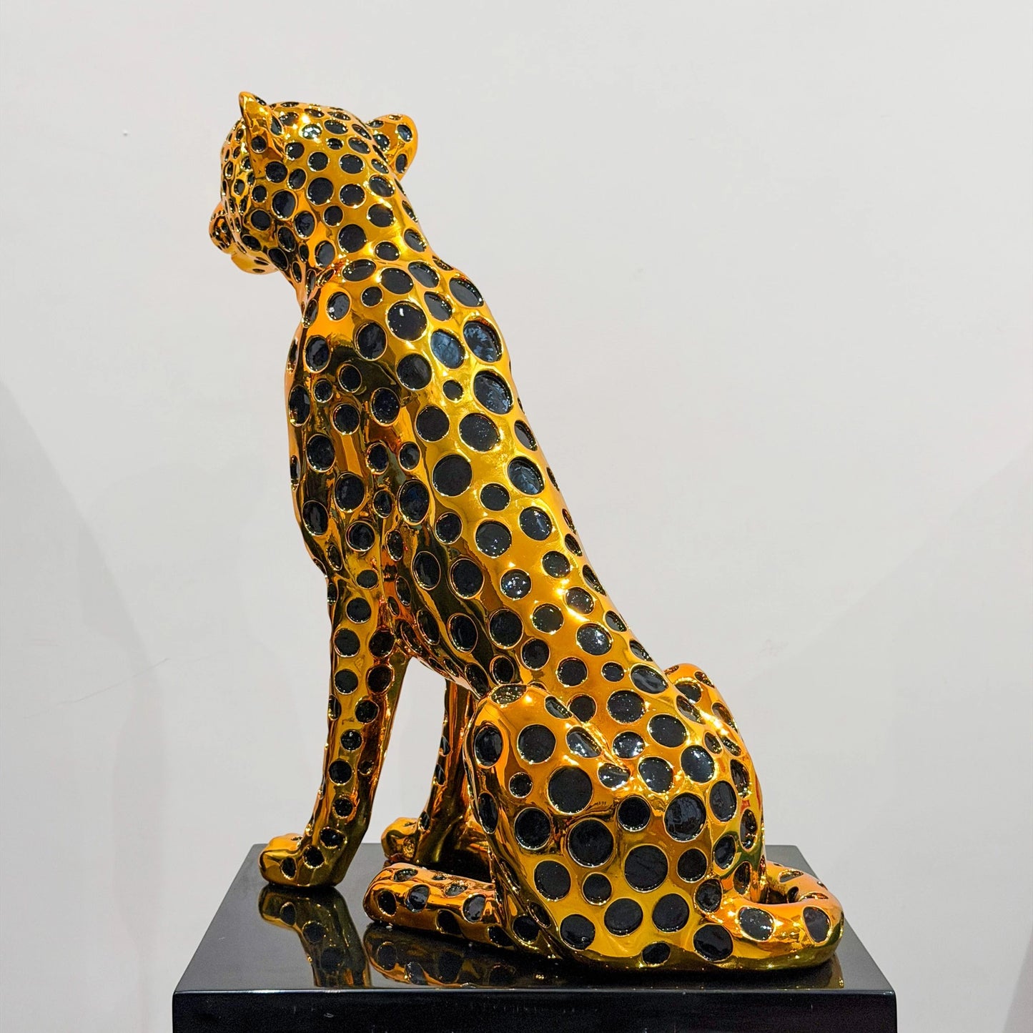 luxury leopard figurine in gold with black detailing modern decor