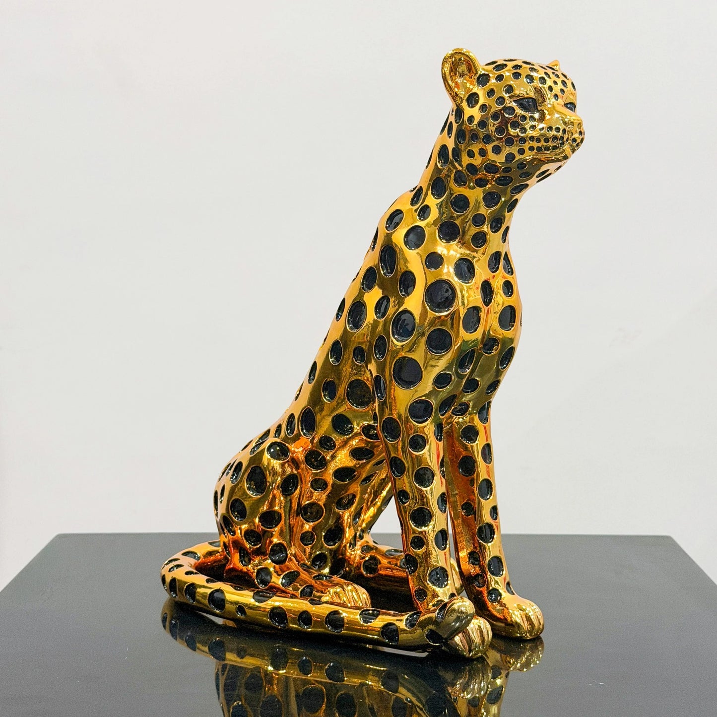 luxury leopard figurine in gold with black detailing modern decor