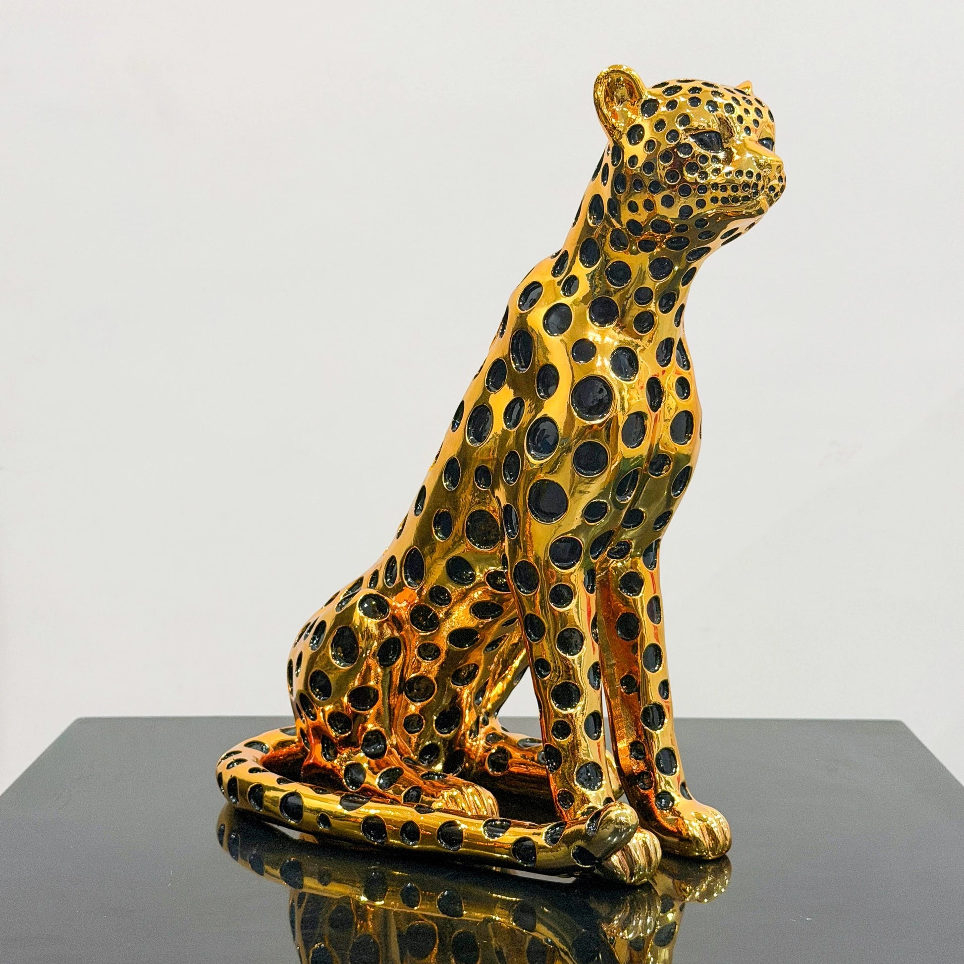 luxury leopard figurine in gold with black detailing modern decor