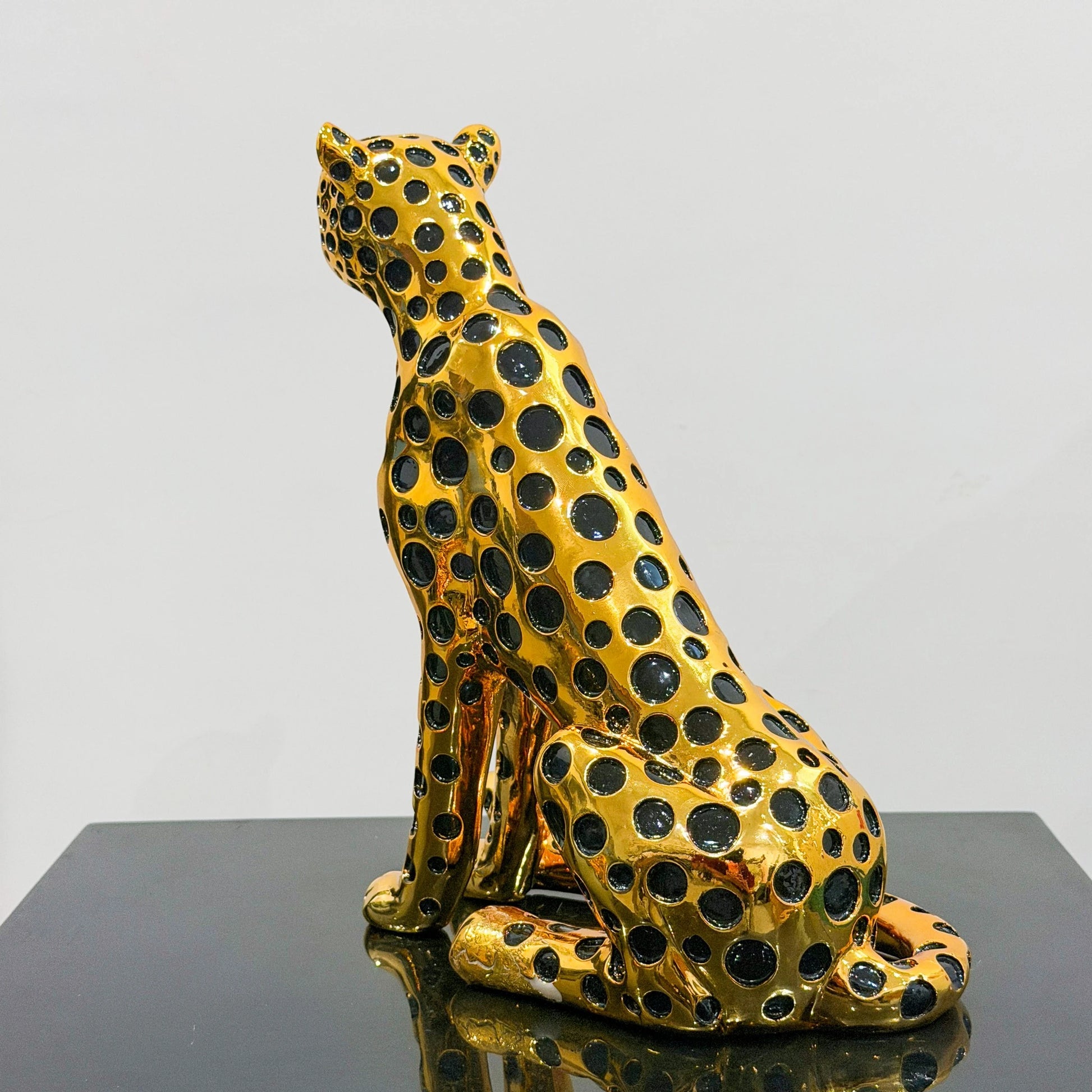 luxury leopard figurine in gold with black detailing modern decor