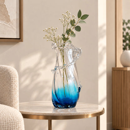 Glass vase with blue gradient on a white background