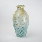 Rounded decorative vase with a narrow neck and marbled finish.