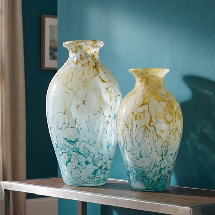 Rounded decorative vase with a narrow neck and marbled finish.