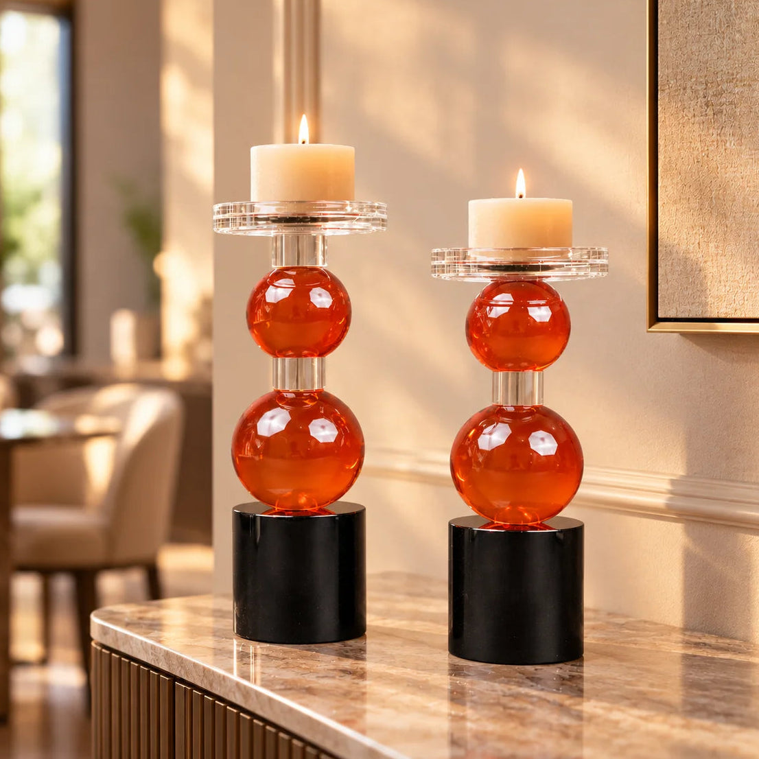 amber glass orb candle holder with black base modern decor