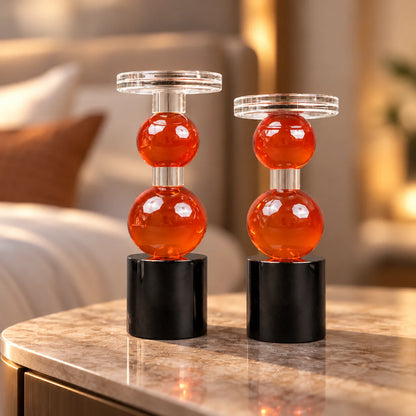 amber glass orb candle holder with black base modern decor