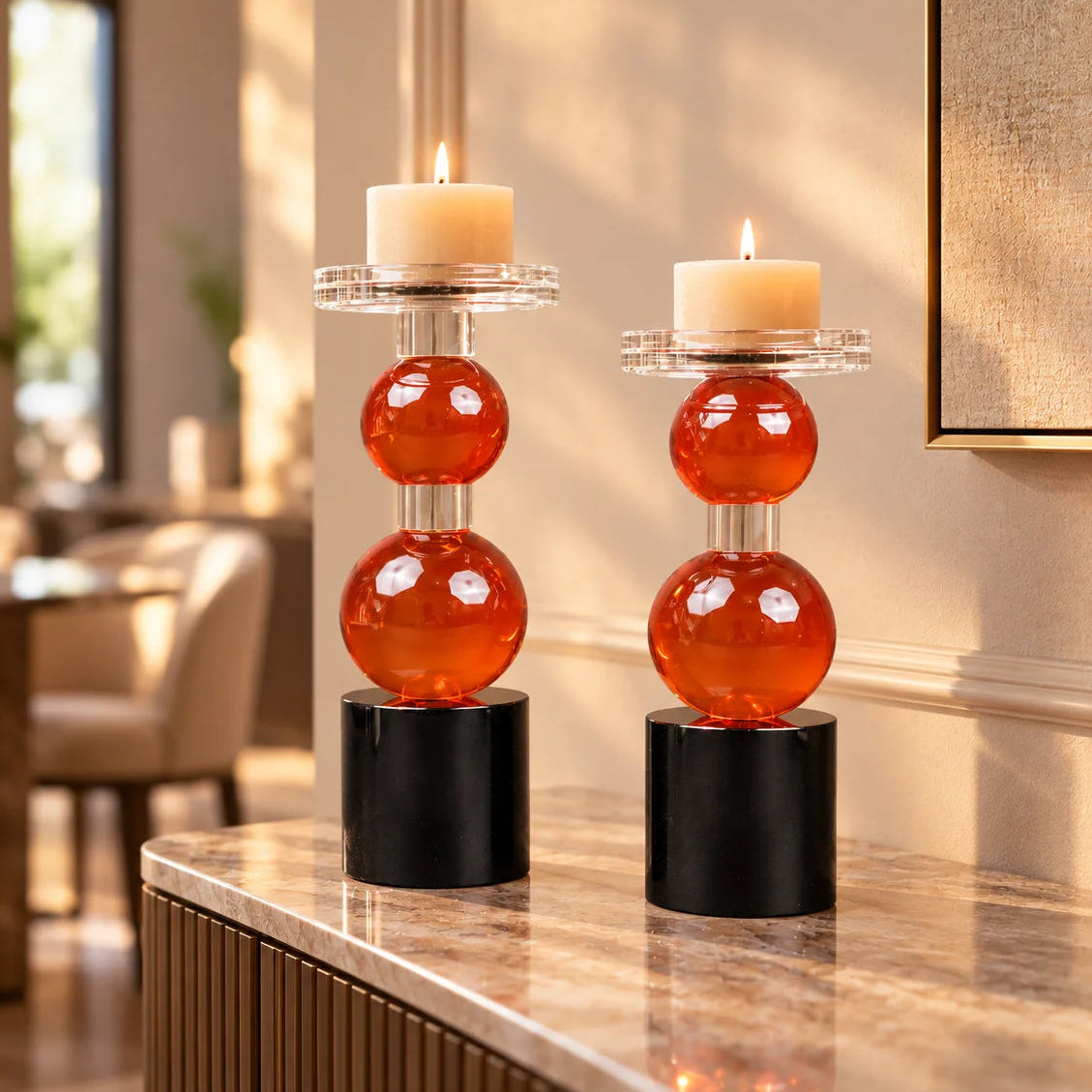 amber glass orb candle holder with black base modern decor