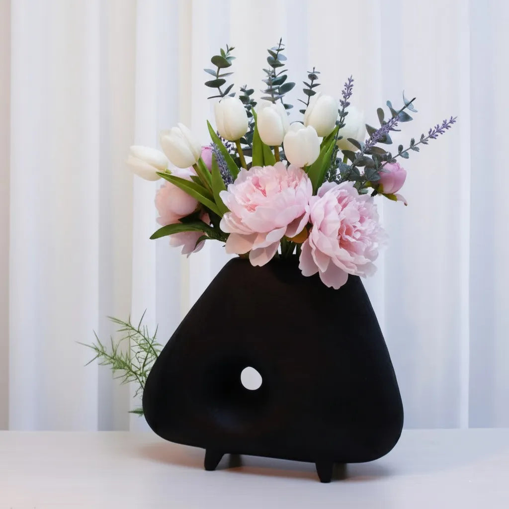 Abstract resin vase in black and white with textured geometric design