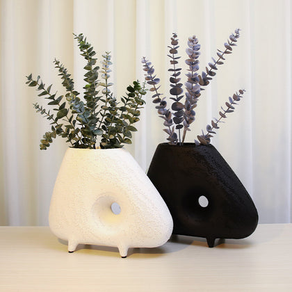 Abstract resin vase in black and white with textured geometric design