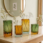 Sunset Gold textured glass vase with a translucent golden body and blue-tinted base