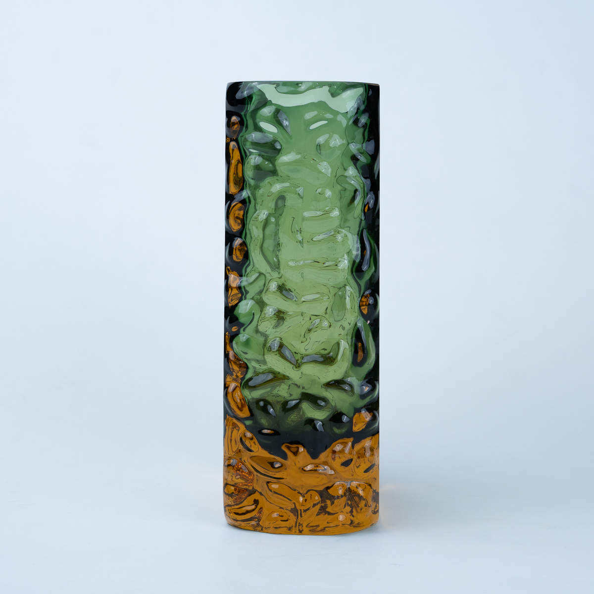 Olive green glass vase with a textured exterior and golden-toned base