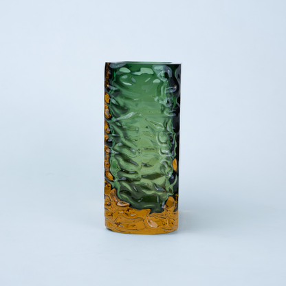 Olive green glass vase with a textured exterior and golden-toned base