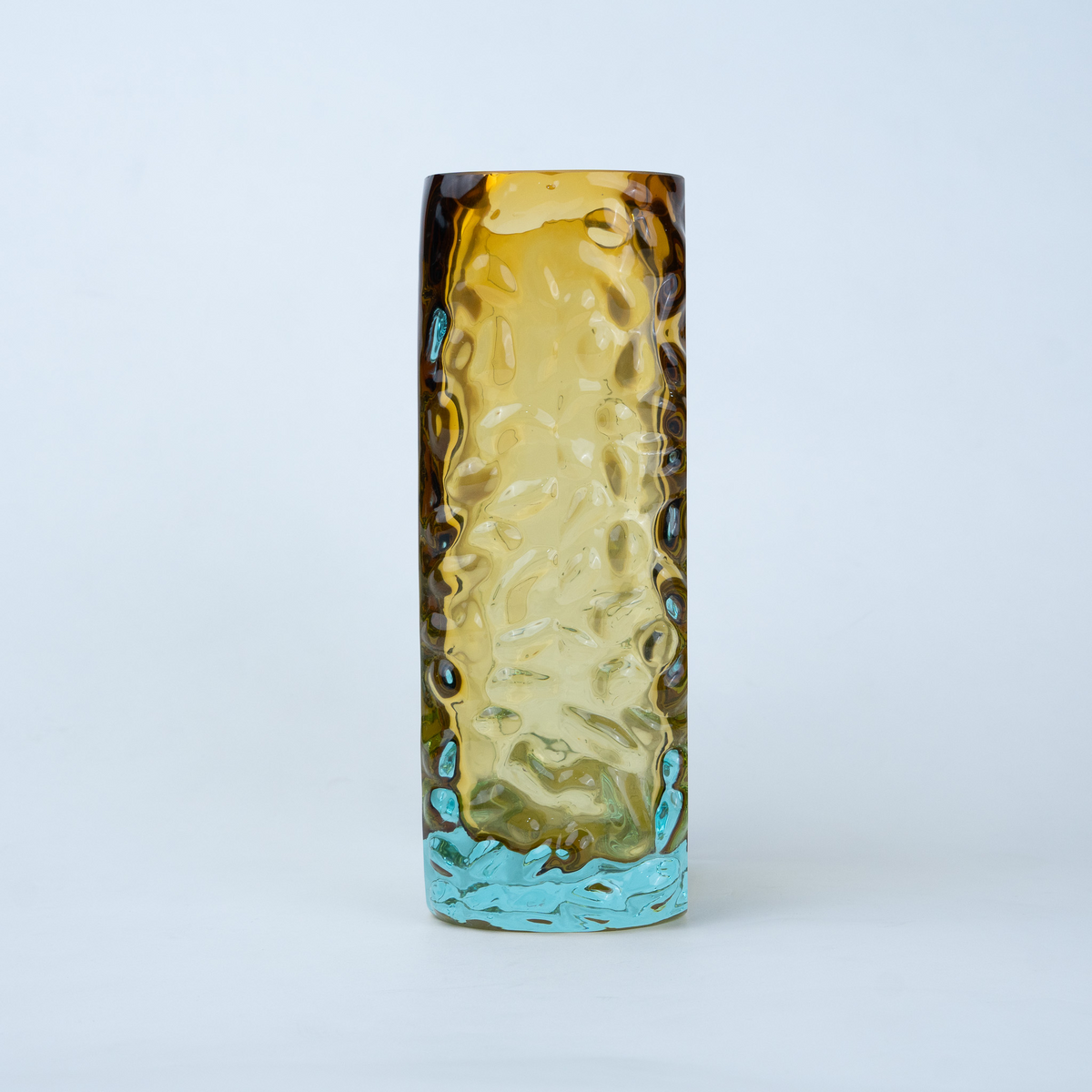 Sunset Gold textured glass vase with a translucent golden body and blue-tinted base